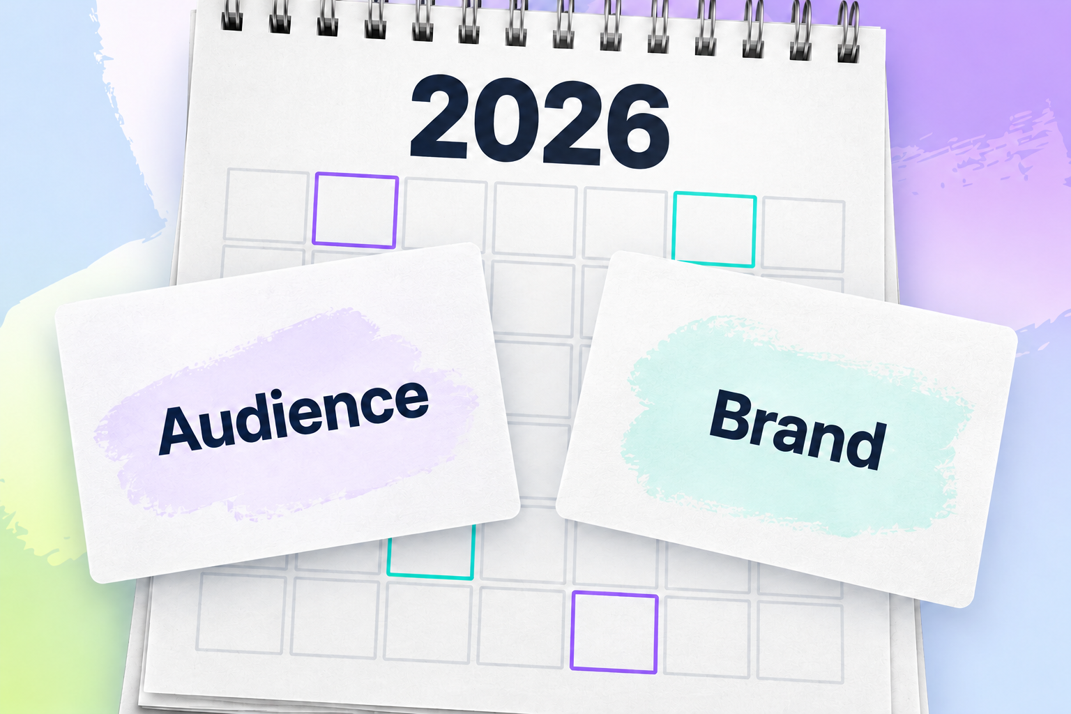 A large spiral-bound 2026 calendar with selected squares outlined in purple and mint, overlaid by two white cards labeled Audience and Brand